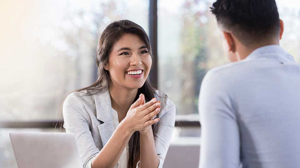 Female consultant talking to a male customer