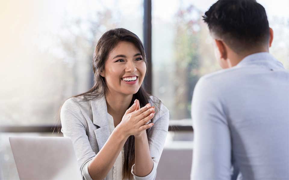 Woman and man talking