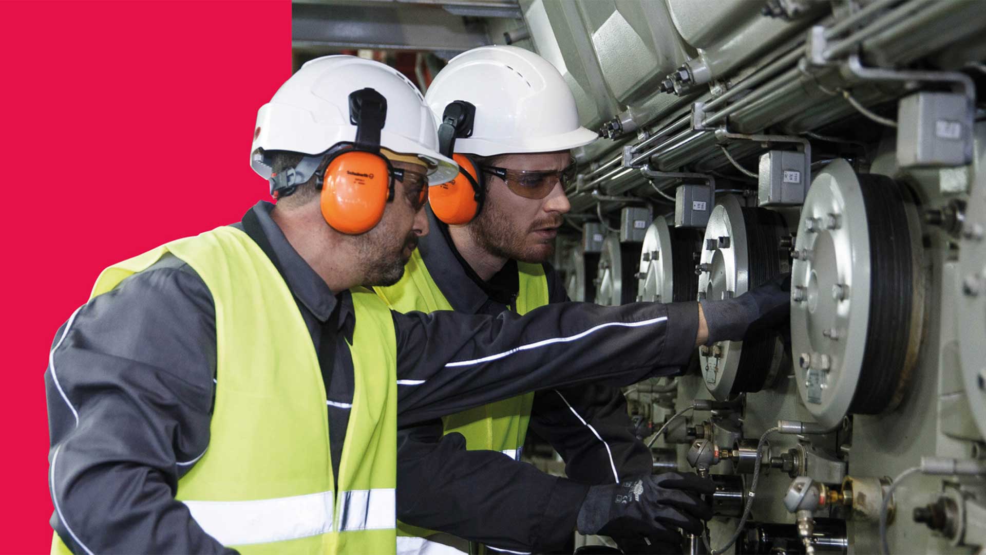Service engineers working at an engine
