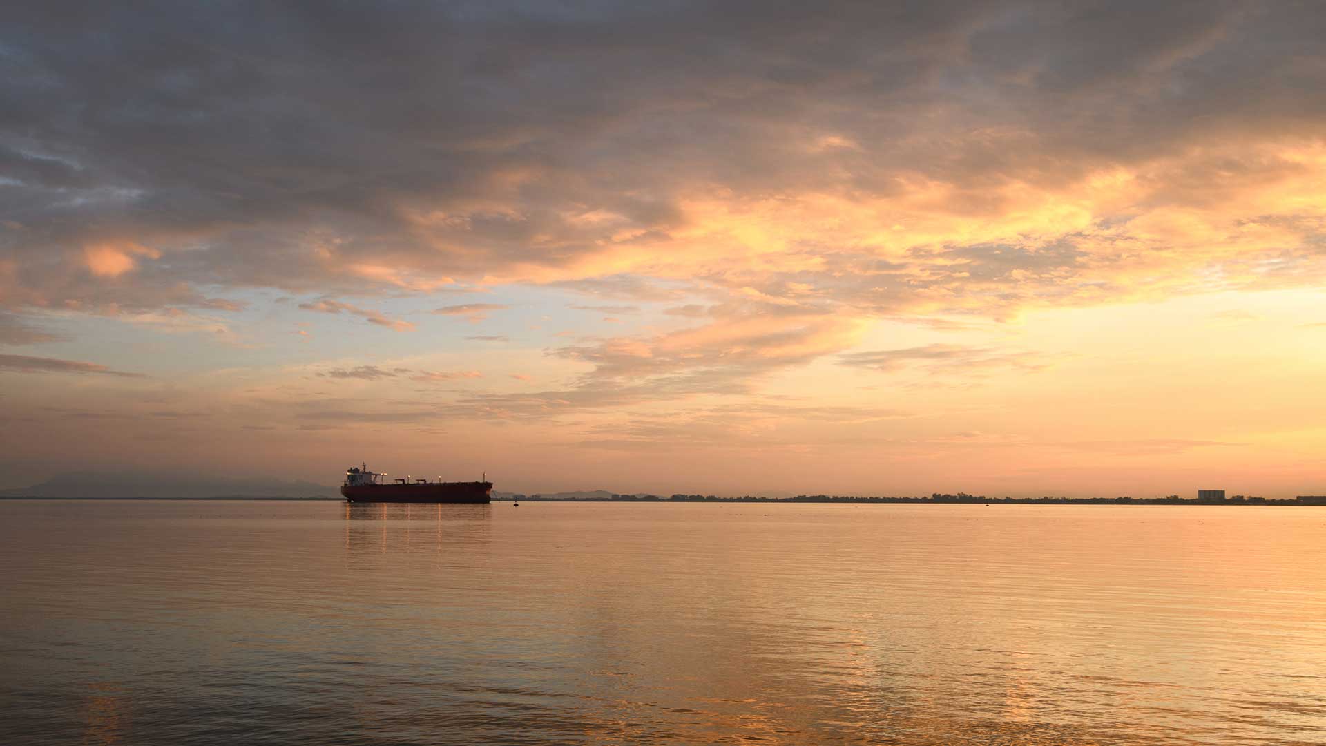 Ship on the water before sunset