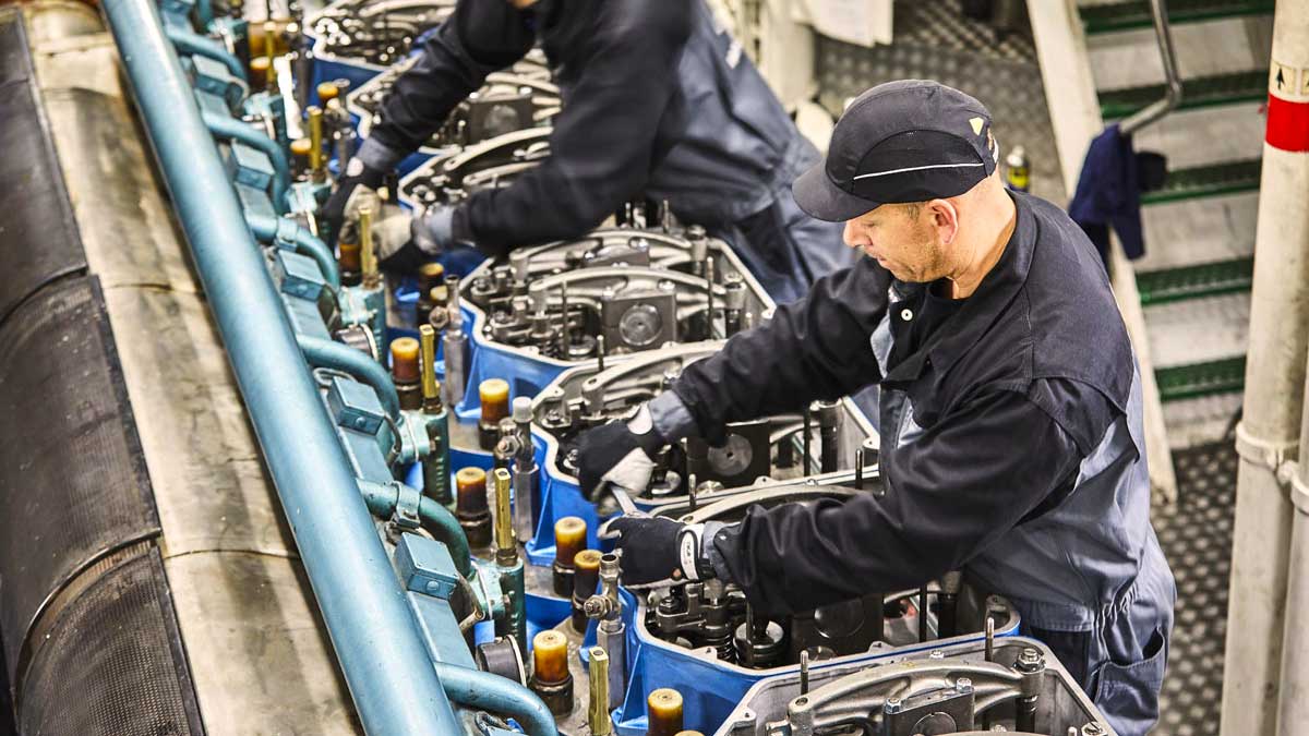 service engineer working on an engine