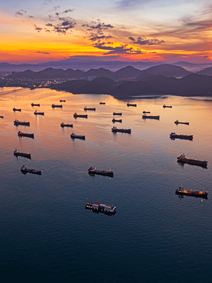 Aerial view of oil tanker cargo ships at sunset