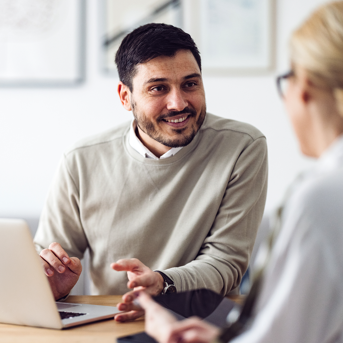 man talking to a woman