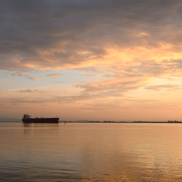 ship in front of sunset