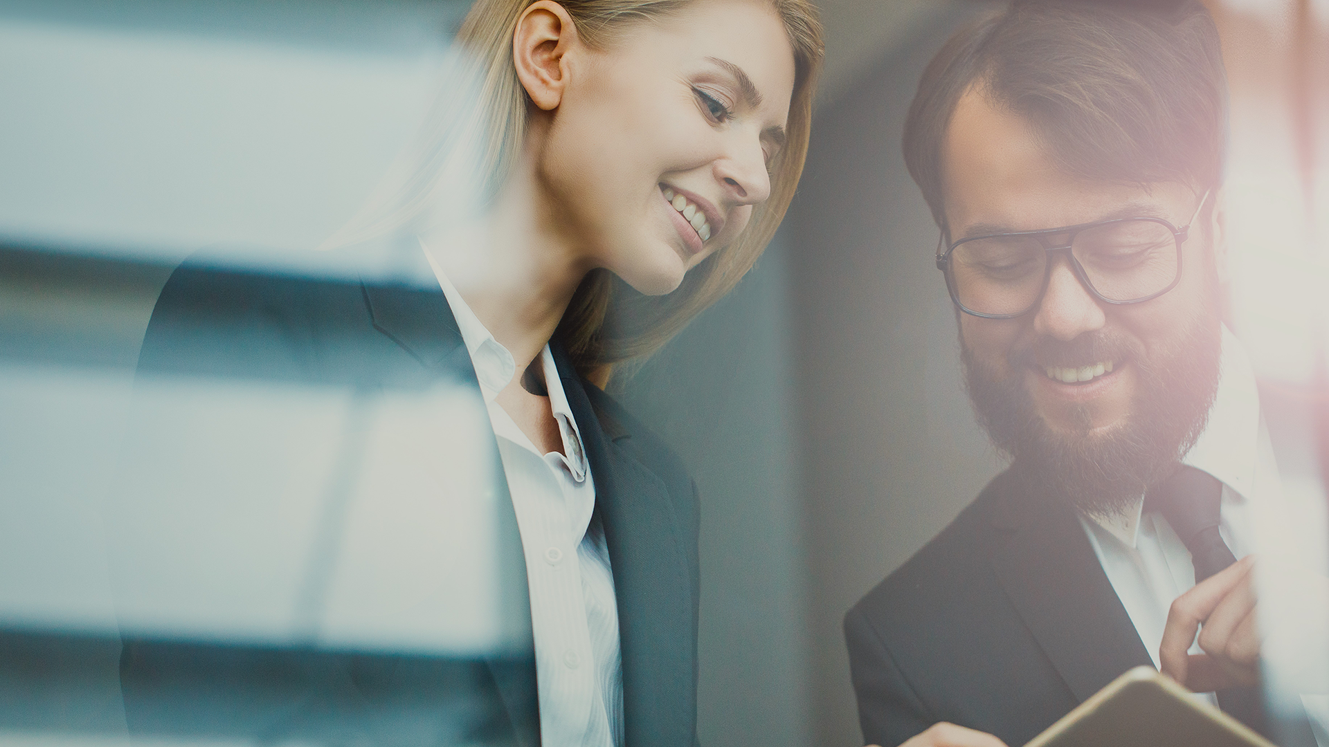 two office workers looking at something
